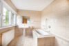 Absolute Rarität! Elegante Architekten-Villa mit grandiosem Ausblick in Bestlage - Bad en Suite