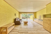 Solides Einfamilienhaus mit großem Garten und sonniger Terrasse in ruhiger Wohnlage - Wohnzimmer