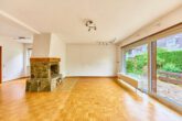 Familienidylle in ruhiger Lage – Großzügiges Reihenendhaus mit Einliegerwohnung - Wohnzimmer_EG