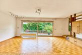 Familienidylle in ruhiger Lage – Großzügiges Reihenendhaus mit Einliegerwohnung - Wohnzimmer_EG