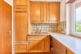 Familienidylle in ruhiger Lage – Großzügiges Reihenendhaus mit Einliegerwohnung - Küche_EG