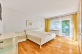 Stilvolles Einfamilienhaus mit Gartenidylle und Wohlfühlatmosphäre - Schlafzimmer