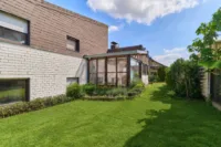 Außergewöhnliche Architektur trifft Raumwunder - Haus mit Wintergarten & großem Außenbereich - Garten