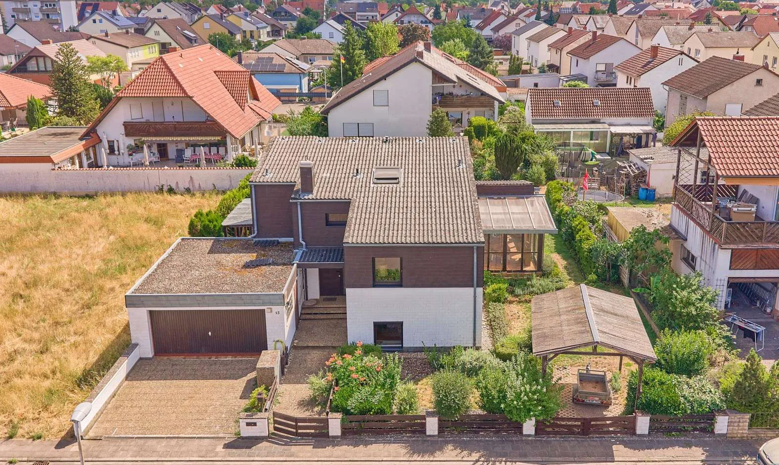 Außergewöhnliche Architektur trifft Raumwunder – Haus mit Wintergarten & großem Außenbereich, 67454 Haßloch, Einfamilienhaus