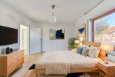 Architektonisches Schmuckstück mit offenem Raumkonzept & uneinsehbarem Garten in Feldnähe - Schlafzimmer - digitales staging