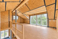 Seltene Gelegenheit: Zwei Häuser auf weitläufigem Grundstück am Feldrand - Wohnzimmer_Neubau