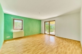 Vielseitiges Wohnhaus mit besonderem Raumkonzept, schönem Garten & Einliegerwohnung - Wohnzimmer Einliegerwohnung