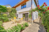 Vielseitiges Wohnhaus mit besonderem Raumkonzept, schönem Garten & Einliegerwohnung - Terrasse Einliegerwohnung