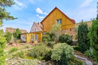 Großzügiges Familienhaus mit optimaler Raumaufteilung & liebevoll angelegtem Garten - Rückansicht