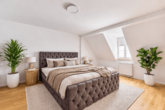 Saniertes Dreiparteienhaus mit guten Mieteinnahmen in 1A-Lage Maximilianstraße - Schlafzimmer_digitales staging