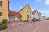 Moderne & helle 3-Zimmer Maisonettewohnung mit eigenem Garten, PV-Anlage & Garage in begehrter Lage - Außenansicht