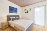 Vermietete 3-Zimmer-Erdgeschosswohnung mit Terrasse und großem Garten - Schlafzimmer