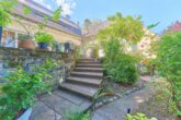 Hochwertiges Zuhause mit Einliegerwohnung & Traumgarten nahe Innenstadt - Terrasse