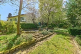 Großzügiges Zuhause mit Wintergarten, weitläufigem Außenbereich & Einliegerwohnung - Garten mit Teich
