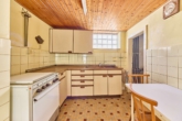 Einfamilienhaus mit weitläufigem Garten und privatem Innenhof - Küche_EG