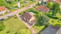 Ihr Rückzugsort im Grünen - stilvolles Einfamilienhaus mit sonnigem Gartenparadies - Luftaufnahme