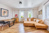 Modernisiertes Wohnhaus mit großzügiger Raumaufteilung in beliebter Lage - Wohnzimmer
