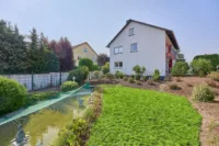 Freistehendes Einfamilienhaus mit Gartenidylle & vielseitigem Platzangebot - Garten