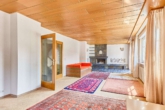 Einfamilienhaus mit Einliegerwohnung und terrassiertem Garten mit Blick über Neustadt - Wohnzimmer