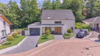 Modernes Zuhause mit lichtdurchflutetem, offenem Raumkonzept & besonderem Gartenambiente - Außenansicht