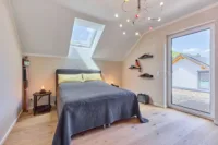Modernes Zuhause mit lichtdurchflutetem, offenem Raumkonzept & besonderem Gartenambiente - Schlafzimmer
