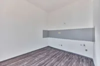 Wertbeständige Kapitalanlage: 9-Parteienhaus mit Altbaucharakter - Küche W6