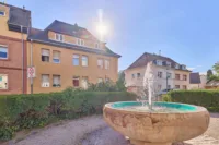 Wertbeständige Kapitalanlage: 9-Parteienhaus mit Altbaucharakter - Straßenansicht