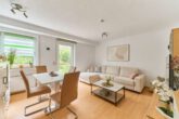 Kapitalanlage: Mehrfamilienhaus mit langfristigem Wertsteigerungspotenzial - Wohnzimmer Beispielwohnung