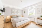 Kapitalanlage: Mehrfamilienhaus mit langfristigem Wertsteigerungspotenzial - Schlafzimmer Beispielwohnung - digitales staging