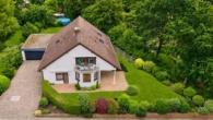 Wohnen mit Mehrwert: Einfamilienhaus mit Einliegerwohnung - Außenansicht