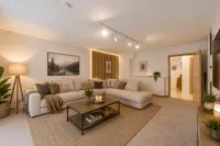 Wohnen mit Mehrwert: Einfamilienhaus mit Einliegerwohnung - Wohnzimmer_KG_digitales_staging