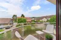 Wohnen mit Mehrwert: Einfamilienhaus mit Einliegerwohnung - Balkon_ELW