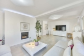 Vielseitig nutzbares Designhaus mit elegantem Outdoor-Living - Wohnzimmer