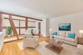 Teilsaniertes Zweifamilienhaus auf der Haardt mit großem Gartengrundstück in sonniger Lage - Wohnzimmer - digitales staging