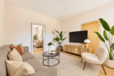 Raum für Ihre Vision - Mehrfamilienhaus oder Abrissgrundstück mit erheblichem Baupotenzial - Staging: Wohnzimmer Wohnung I