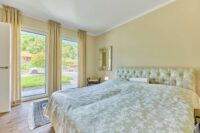 Elegantes Architektenhaus mit optimaler Raumaufteilung vereint Design, Komfort & Natur - Gästezimmer