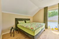 Elegantes Architektenhaus mit optimaler Raumaufteilung vereint Design, Komfort & Natur - Schlafzimmer