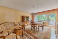 Großzügiges Zuhause in grüner Hanglage mit großem Balkon & zwei separierbaren Ebenen - Wohnzimmer OG