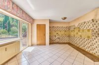 Großzügiges Zuhause in grüner Hanglage mit großem Balkon & zwei separierbaren Ebenen - Küche OG