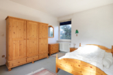 Exklusiver Architekten-Bungalow mit traumhaftem Gartengrundstück in besonderer Ortskernlage von Haßloch - Schlafzimmer