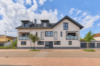 Stilvolle Maisonette-Wohnung mit moderner Ausstattung, Balkon und Garage - Außenansicht