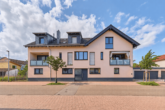 Stilvolle Maisonette-Wohnung mit moderner Ausstattung, Balkon und Garage - Außenansicht