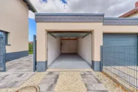 Premiumwohnen im Erdgeschoss – modernste Haustechnik, Terrasse, Garten & maximaler Komfort - Garage