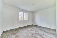Premiumwohnen im Erdgeschoss – modernste Haustechnik, Terrasse, Garten & maximaler Komfort - Zimmer 1