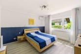 Wohnen auf einer Ebene – Bungalow mit sonnigem Traumgarten - Schlafzimmer