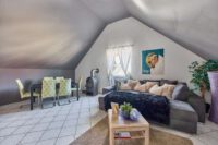 Wohnen mit Extra-Vorteil: Familienwohnhaus mit vermieteter Souterrainwohnung und sicheren Einnahmen - Dachgeschosszimmer