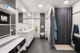 Wohnen mit Extra-Vorteil: Familienwohnhaus mit vermieteter Souterrainwohnung und sicheren Einnahmen - Badezimmer UG