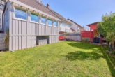 Wohnen mit Extra-Vorteil: Familienwohnhaus mit vermieteter Souterrainwohnung und sicheren Einnahmen - Garten