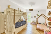 Effizienzhaus 70: Architektenbungalow mit traumhaftem Panoramablick - Kinderzimmer