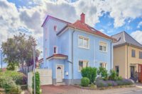 Modernisiertes Smart Home mit Designbad, SwimSpa & traumhaftem Familiengarten - Außenansicht